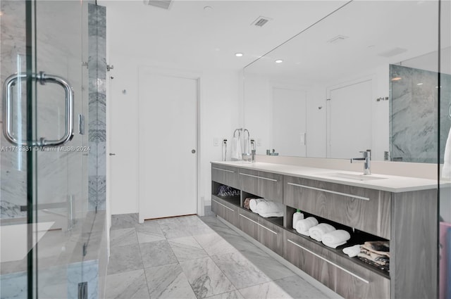 bathroom featuring vanity and walk in shower