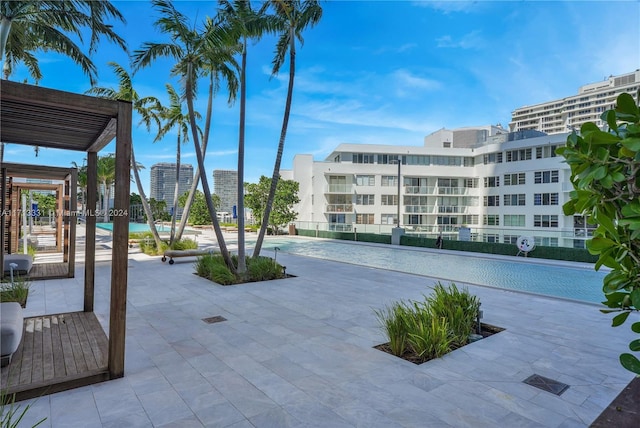 view of pool featuring a patio area