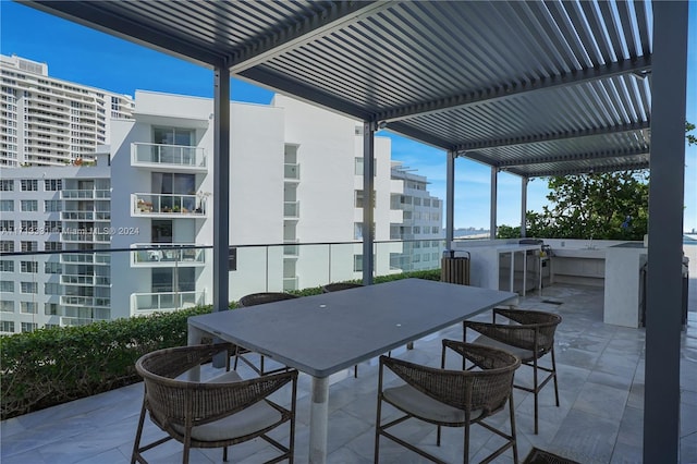 view of patio with a pergola and an outdoor bar