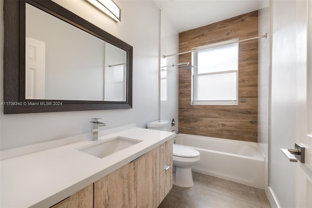 full bathroom featuring tile patterned floors, vanity, toilet, and shower / bathtub combination