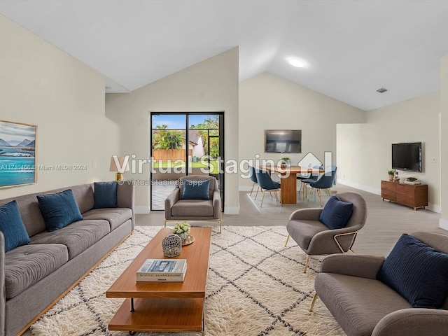 living room with vaulted ceiling