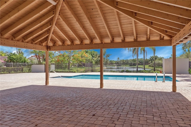 view of pool featuring a gazebo and a patio area