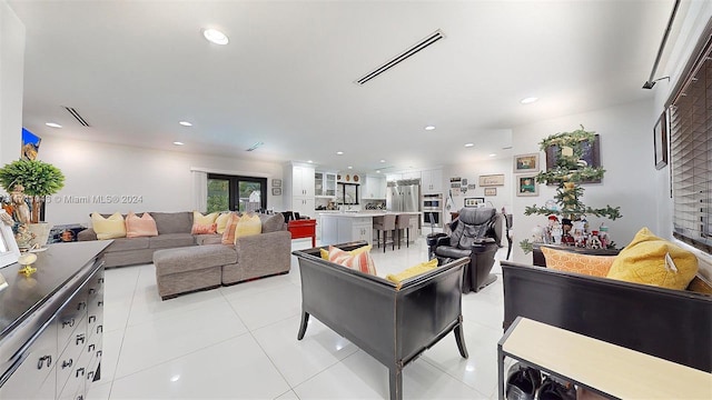 living room featuring light tile patterned floors