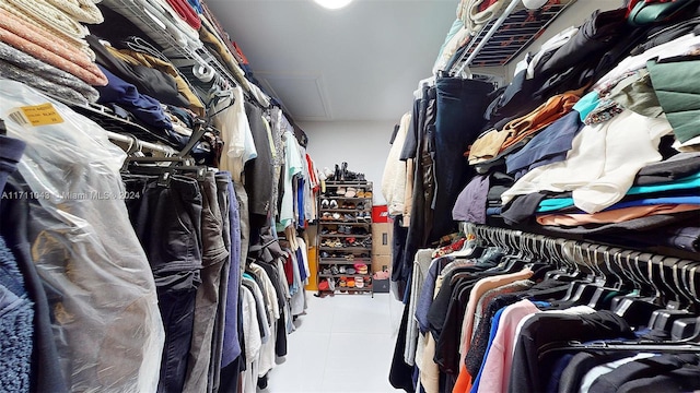 walk in closet featuring tile patterned floors