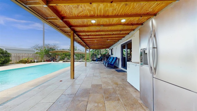 view of pool with a patio area