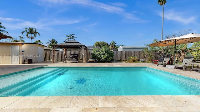 view of pool featuring a gazebo and a patio area