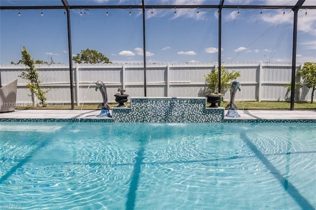 view of swimming pool featuring pool water feature