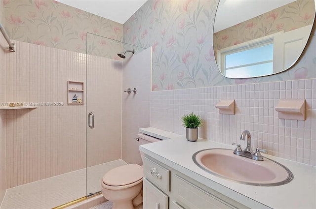 410 Miller Rd, Coral Gables, FL 33146 - full bath with wallpapered walls, a shower stall, toilet, vanity, and tile walls