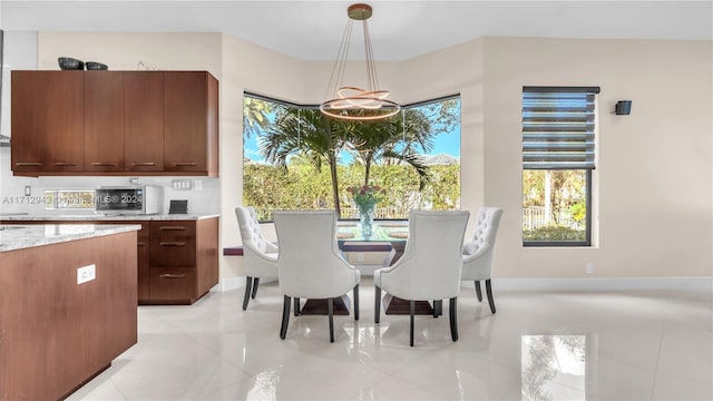 dining room with light tile patterned floors