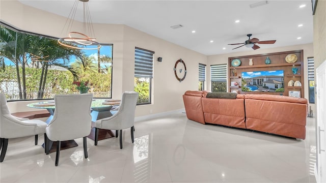 dining space with light tile patterned floors, ceiling fan, and a healthy amount of sunlight