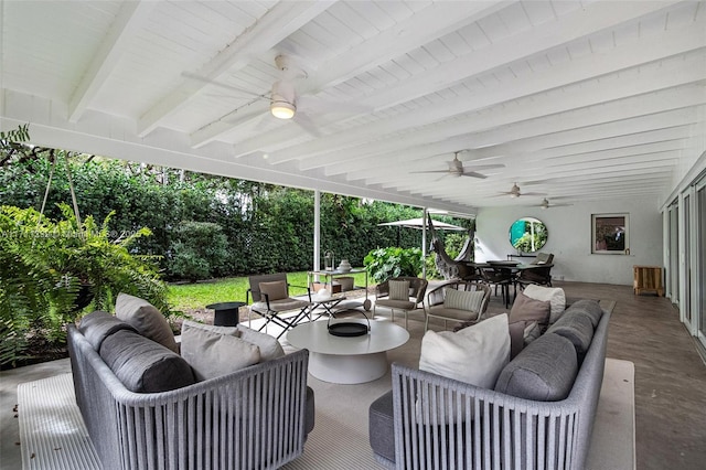 view of patio with ceiling fan and an outdoor hangout area