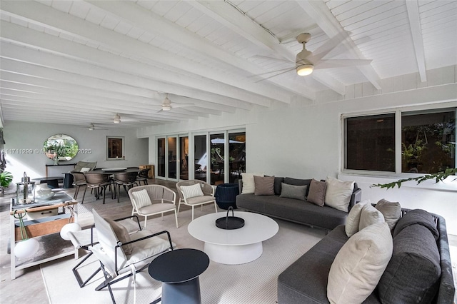 living room with beam ceiling