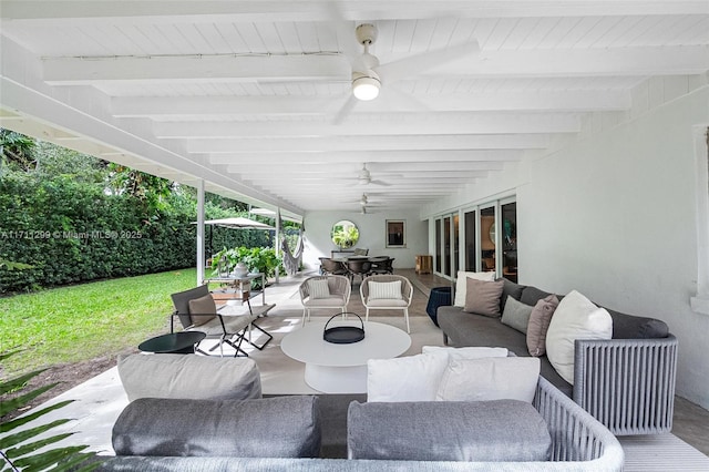 view of patio with radiator, ceiling fan, and an outdoor living space