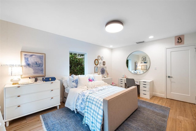 bedroom featuring light wood-type flooring