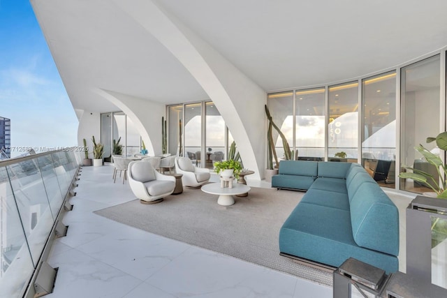 view of patio / terrace with an outdoor living space and a balcony