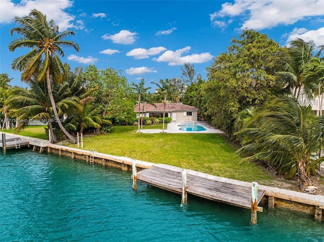 dock area featuring a yard, a water view, and a patio area