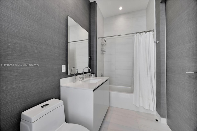 full bathroom featuring vanity, toilet, and shower / bath combo with shower curtain