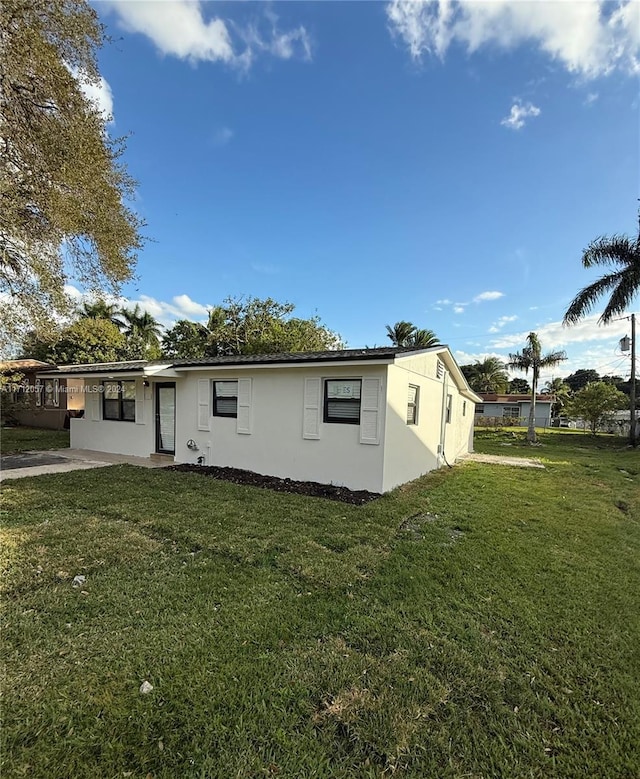 exterior space featuring a yard