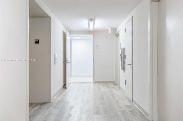 corridor featuring light wood-type flooring