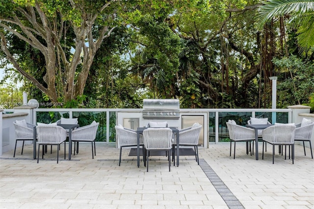 view of patio / terrace featuring a grill and area for grilling