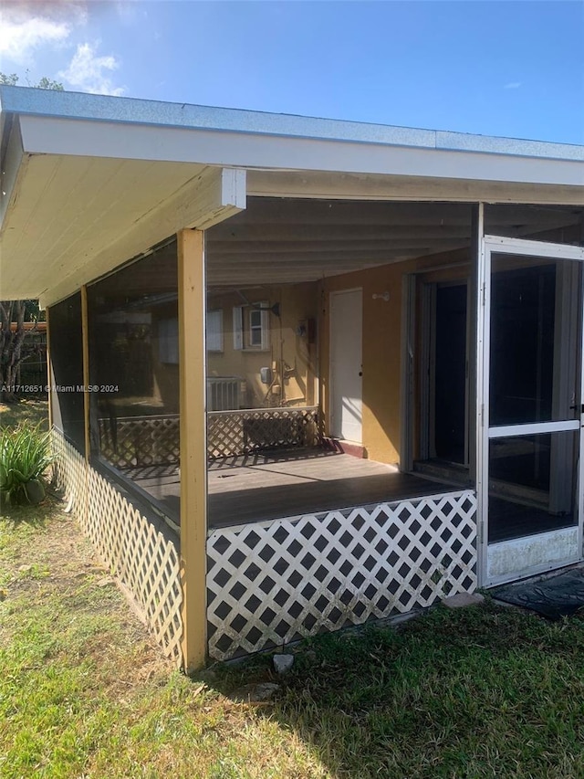 view of patio / terrace with a sunroom