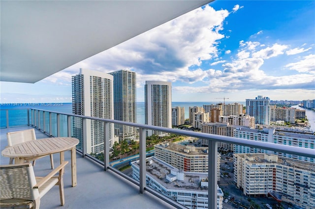 balcony featuring a water view