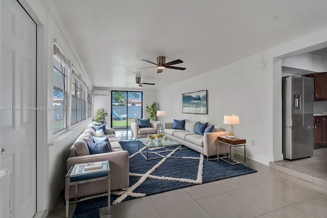 living room featuring light tile patterned floors and ceiling fan