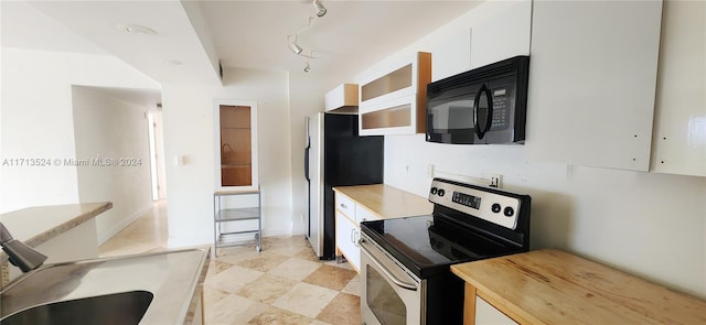 kitchen with white cabinets and stainless steel appliances