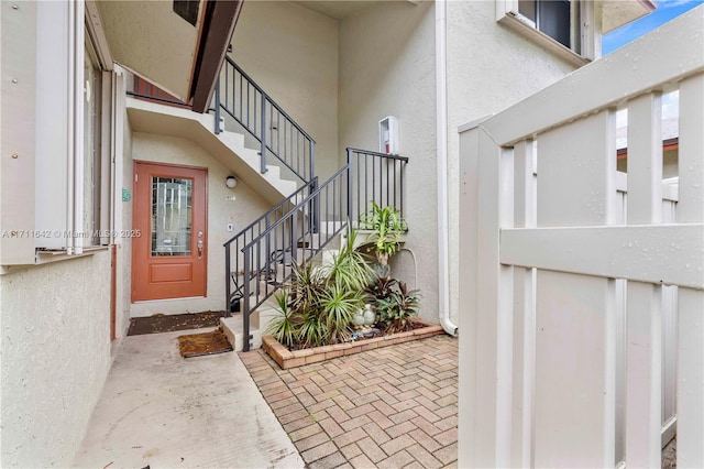 1750 NE 39th Ct Unit 808, Pompano Beach, FL 33064 - view of exterior entry with stucco siding