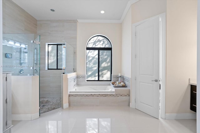 bathroom with tile patterned floors, plus walk in shower, vanity, and ornamental molding