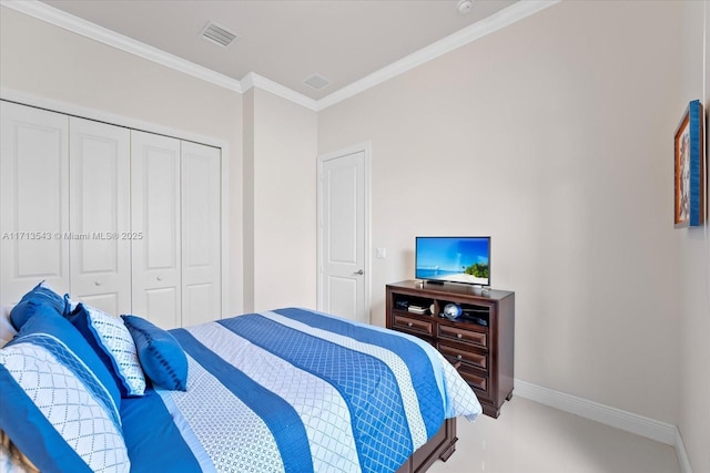 carpeted bedroom with ornamental molding and a closet