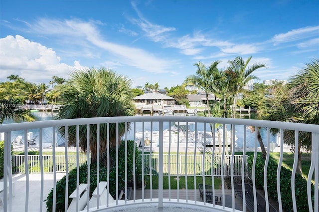 balcony featuring a water view