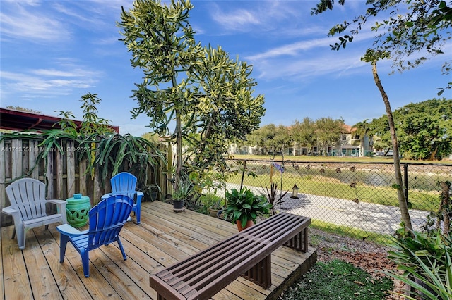 wooden deck featuring fence