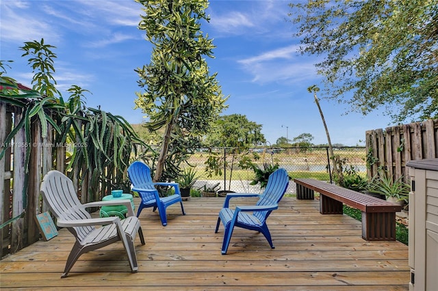 wooden deck featuring fence