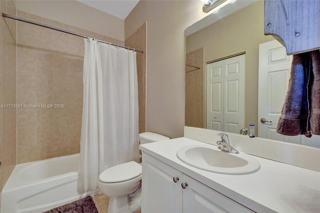 bathroom featuring toilet, tile patterned flooring, shower / bathtub combination with curtain, vanity, and a closet