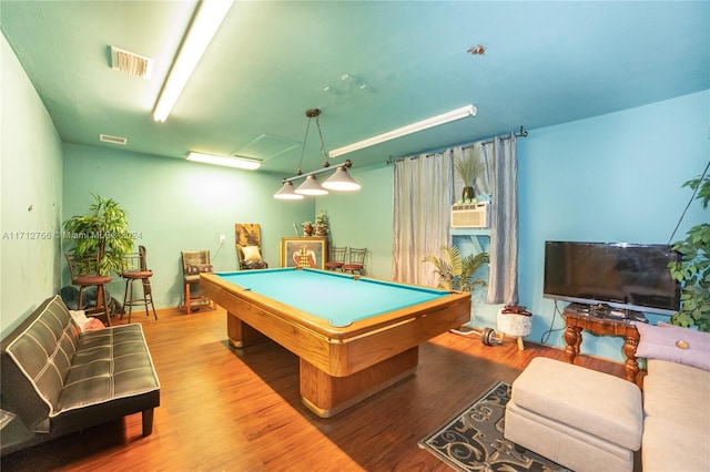 playroom featuring cooling unit, wood-type flooring, and pool table