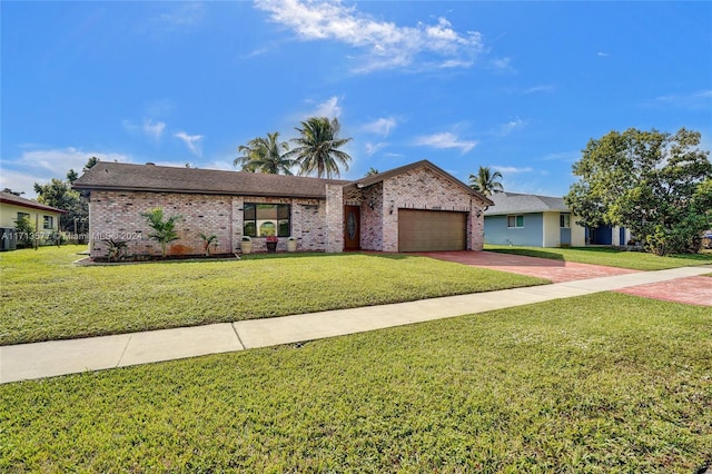 ranch-style home with a garage and a front yard