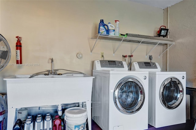 washroom featuring washer and dryer