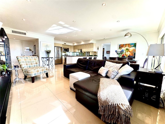 tiled living room featuring ornamental molding