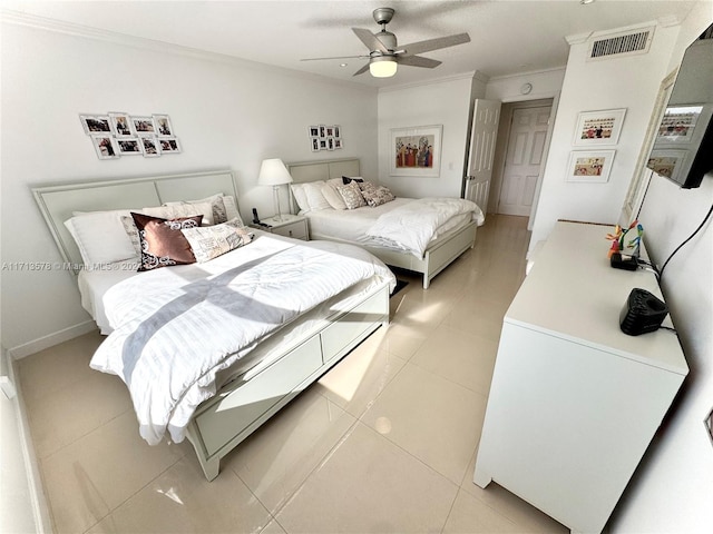 tiled bedroom featuring ceiling fan and crown molding