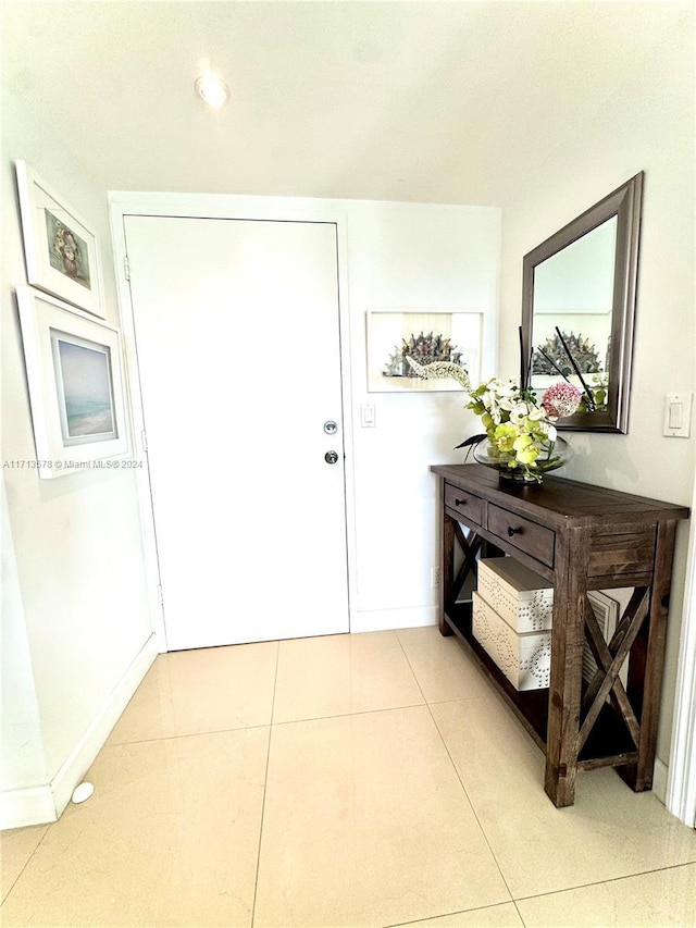 foyer entrance featuring tile patterned flooring