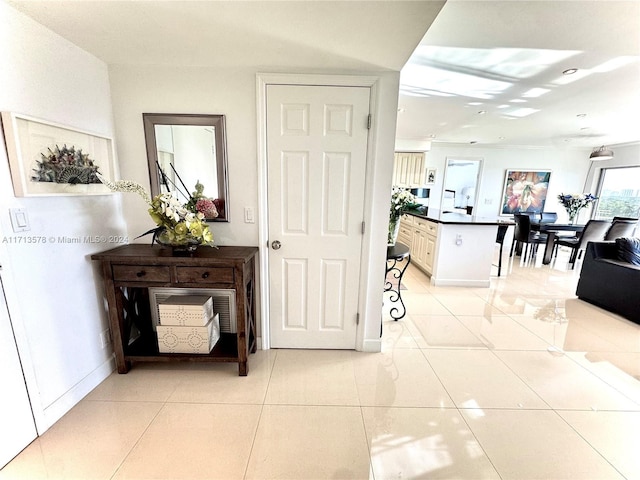 hallway with light tile patterned floors