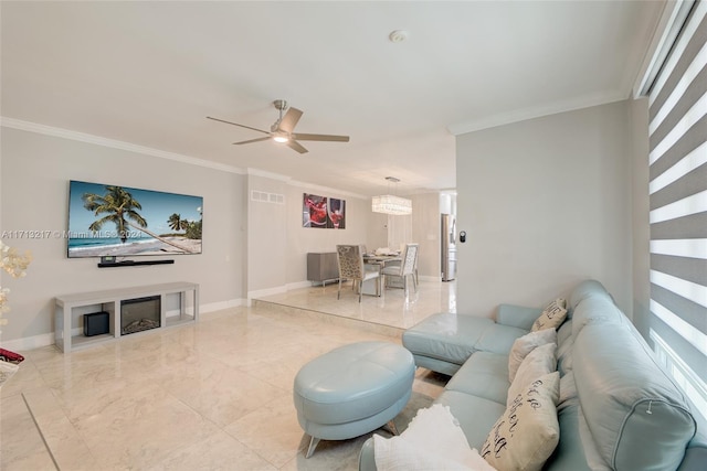 living room featuring ceiling fan and crown molding