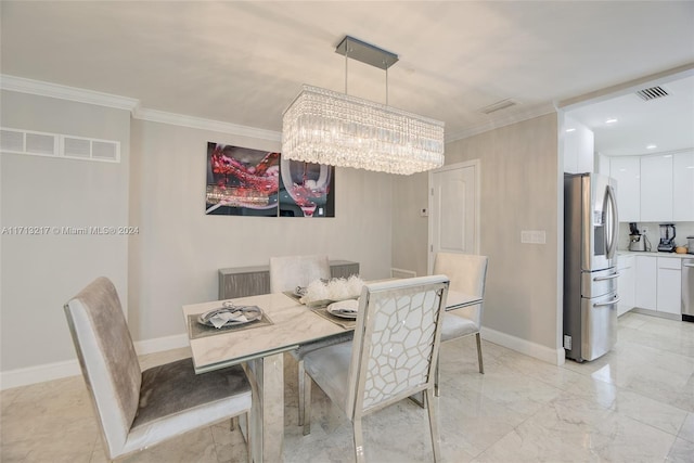 dining area featuring a notable chandelier and crown molding