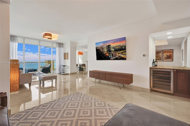 interior space featuring floor to ceiling windows and beverage cooler