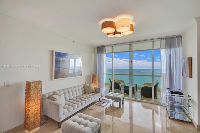 living room with expansive windows, a water view, and ornamental molding