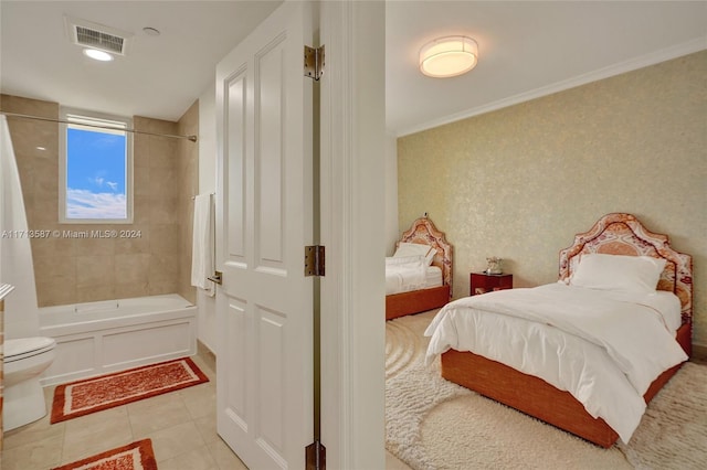 bedroom featuring light tile patterned floors