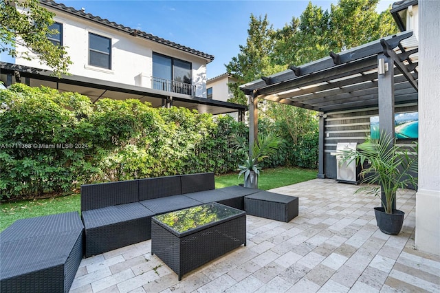 view of patio with a pergola and an outdoor hangout area