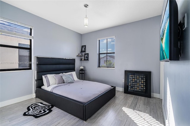 bedroom featuring light hardwood / wood-style flooring