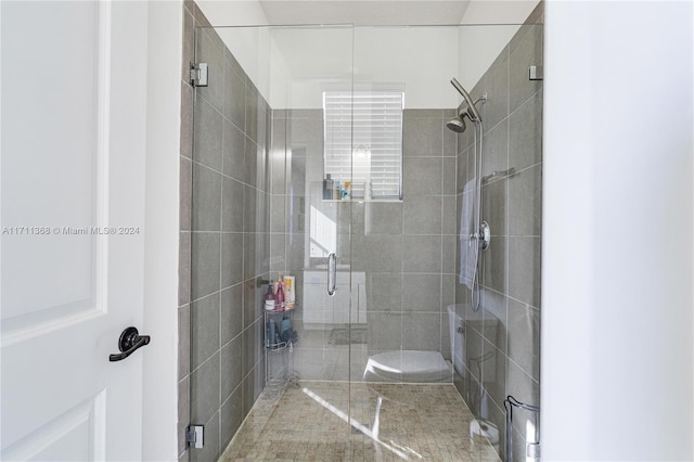 bathroom with toilet and walk in shower